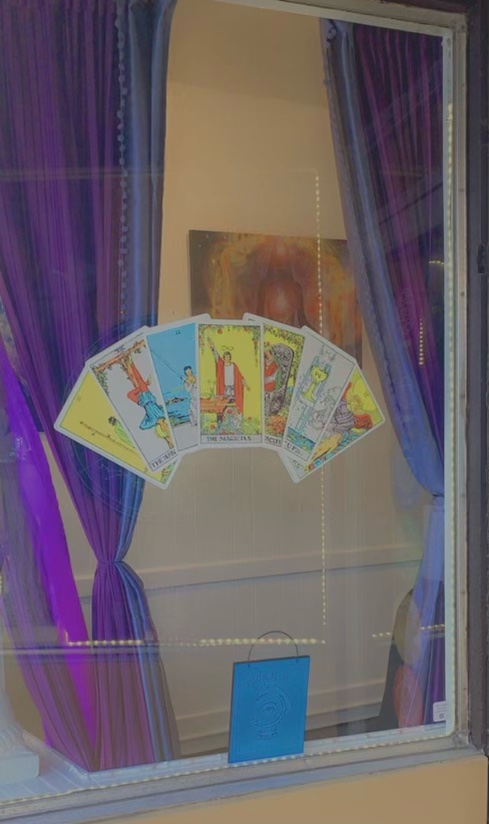 Tarot cards fanned in the shoppe window